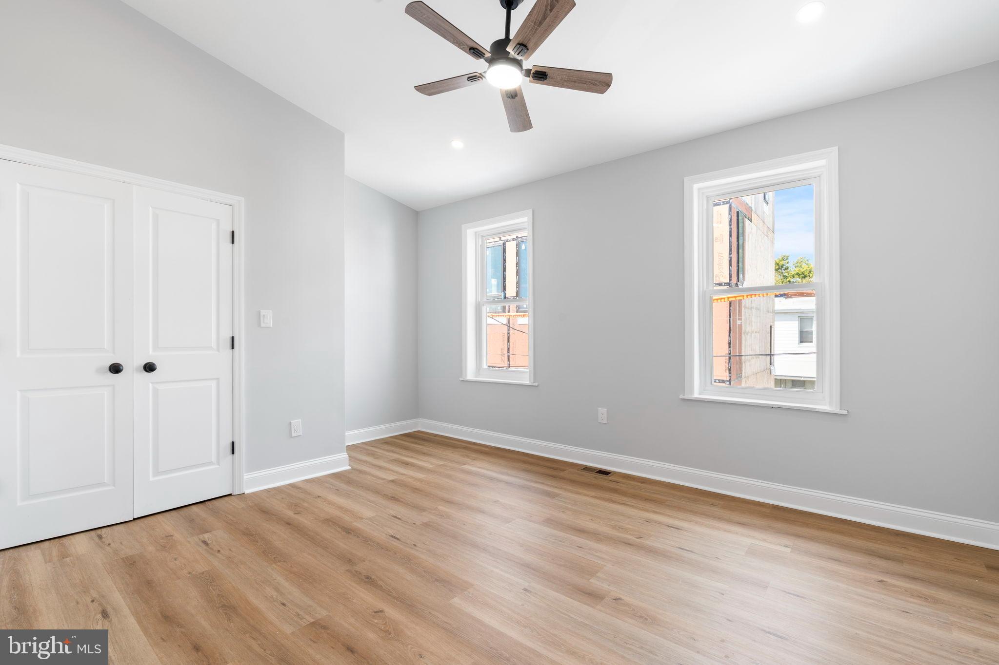 3464 Division Street Philadelphia, PA 19129 - Photo 24 of 40 a view of an empty room with window and wooden floor