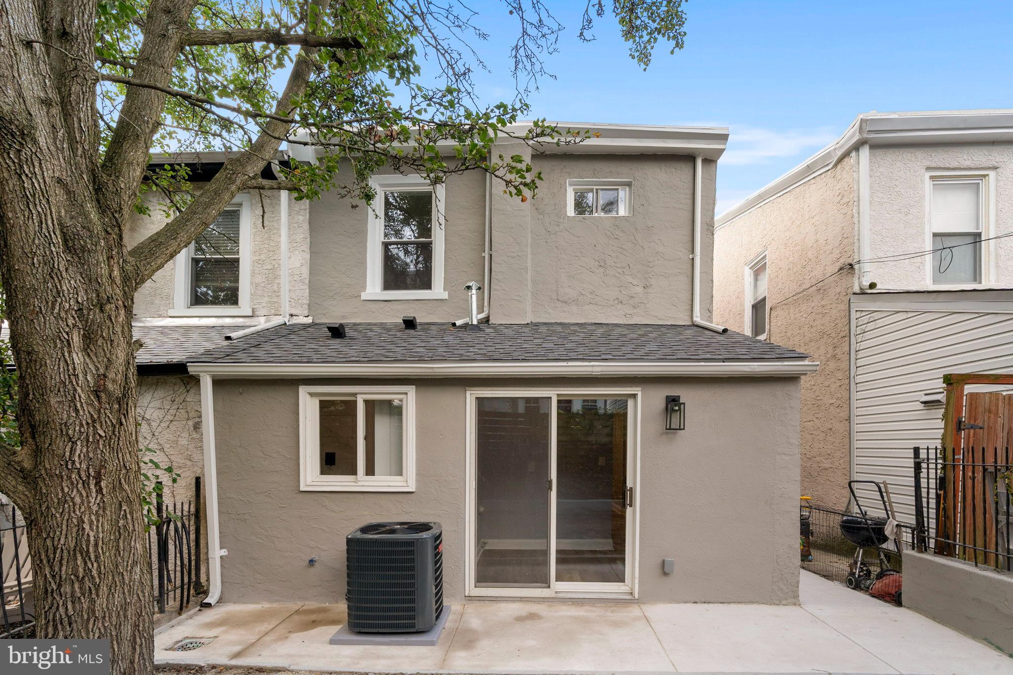 3464 Division Street Philadelphia, PA 19129 - Photo 26 of 40 a view of a house with a tree