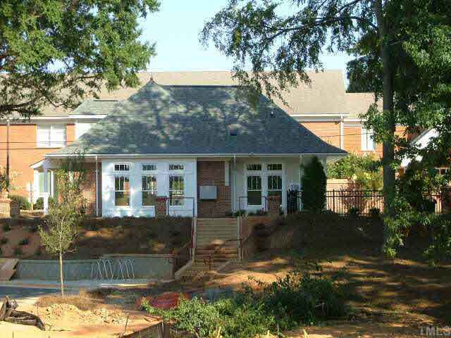 2114 Pine Drive Raleigh, NC 27608 - Photo 8 of 9 a front view of a house with a yard