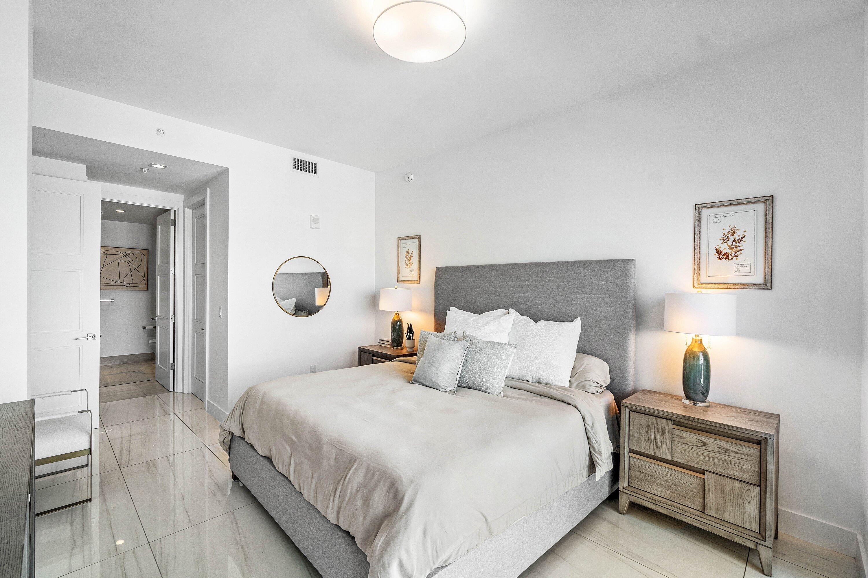 155 East Boca Raton Road, Unit 1119 Boca Raton, FL 33432 - Photo 13 of 42 a bedroom with bed and window