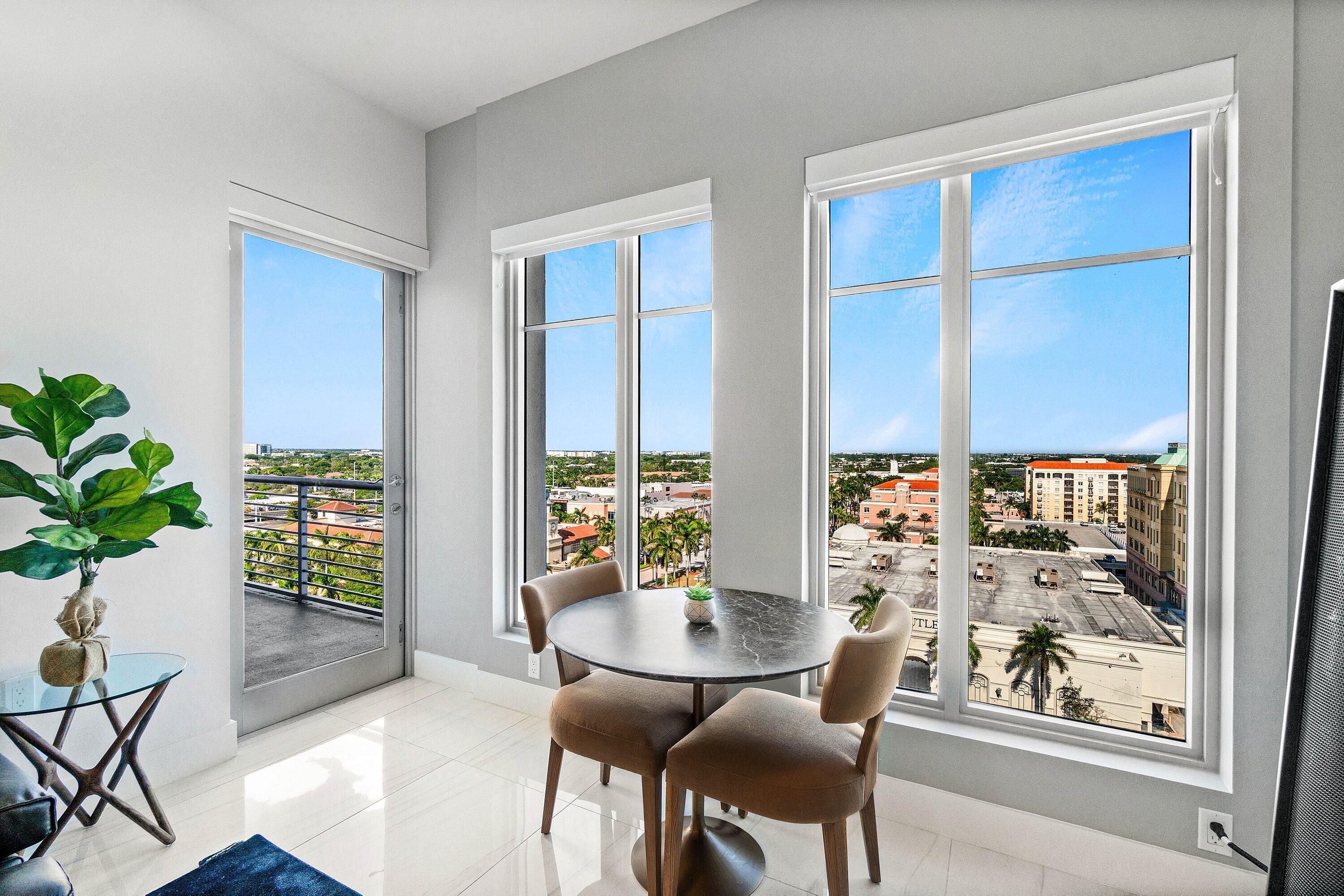 155 East Boca Raton Road, Unit 1119 Boca Raton, FL 33432 - Photo 8 of 42 a dining room with furniture and a potted plant