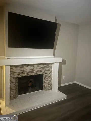 a view of sitting area with furniture and a window