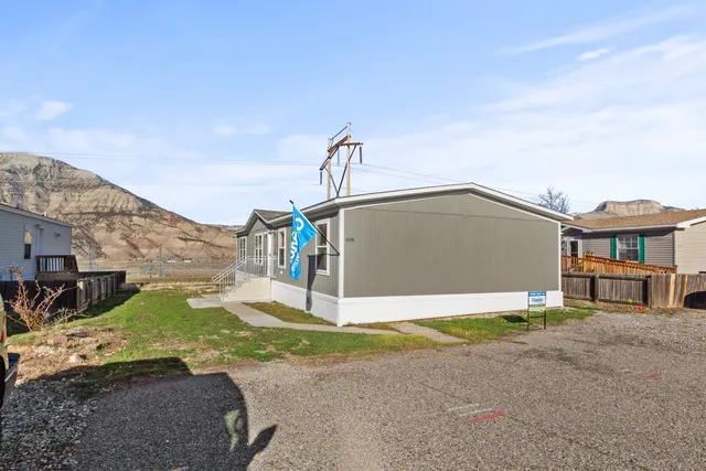 a house with trees in front of it