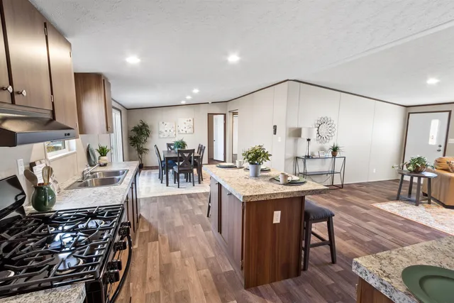 a view of a kitchen and dining room
