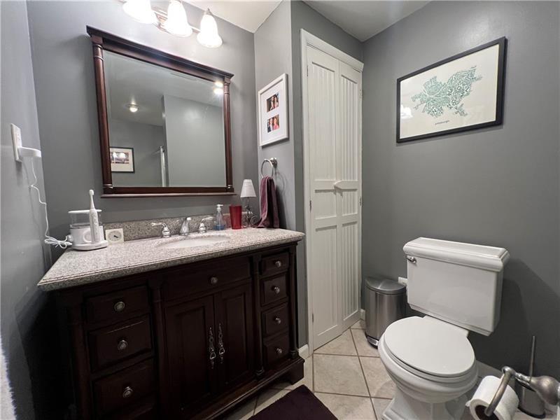 117 Virginia Road Pittsburgh, PA 15237 - Photo 19 of 37 a bathroom with a toilet a sink and mirror