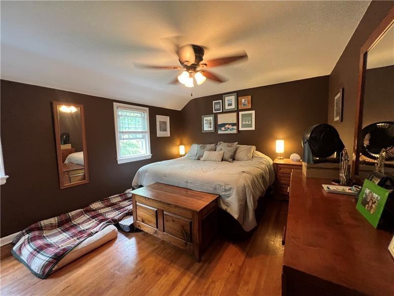 117 Virginia Road Pittsburgh, PA 15237 - Photo 27 of 37 a bedroom with bed window and couch