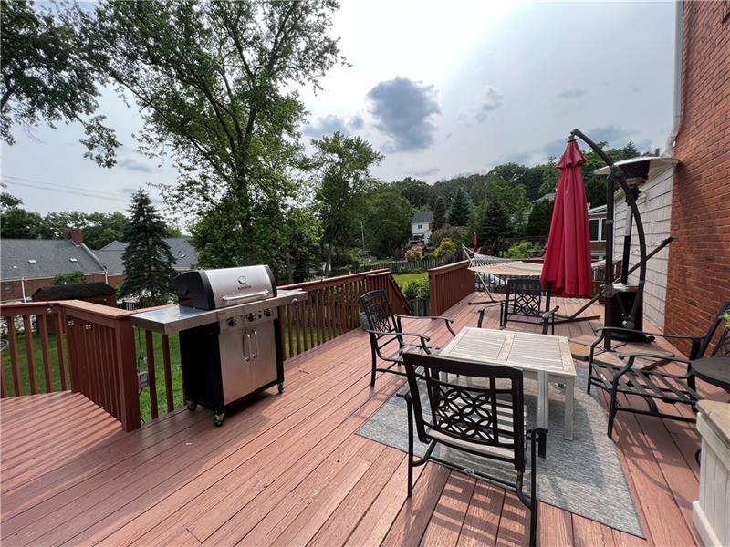 117 Virginia Road Pittsburgh, PA 15237 - Photo 31 of 37 a view of a roof deck with table and chairs a barbeque with wooden floor and fence