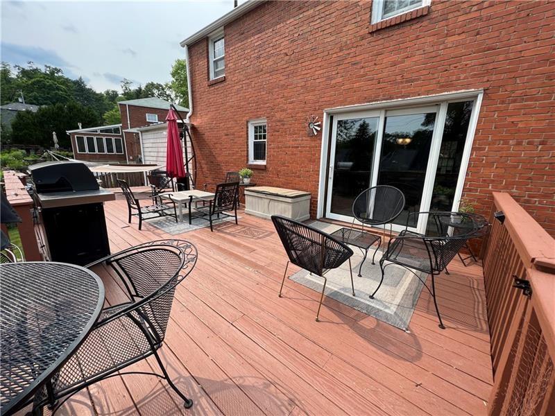 117 Virginia Road Pittsburgh, PA 15237 - Photo 32 of 37 a view of a dinning tables and chairs in patio of the house