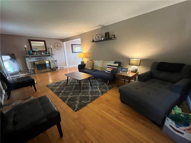 117 Virginia Road Pittsburgh, PA 15237 - Photo 8 of 37 a living room with furniture and wooden floor