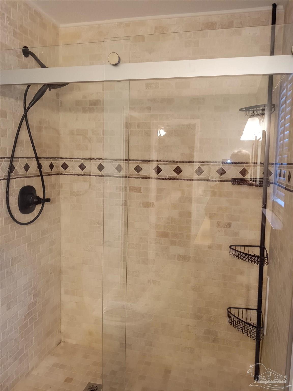 5837 Hermitage Circle Milton, FL 32570 - Photo 20 of 31 a bathroom with a shower