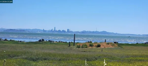 a view of lake and mountain