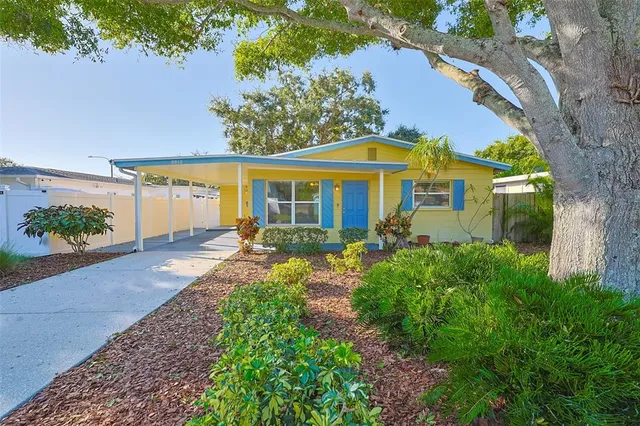 front view of a house with a yard