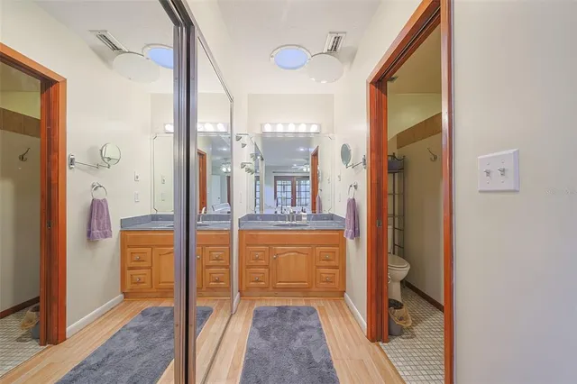 a view of a livingroom with a ceiling fan and window