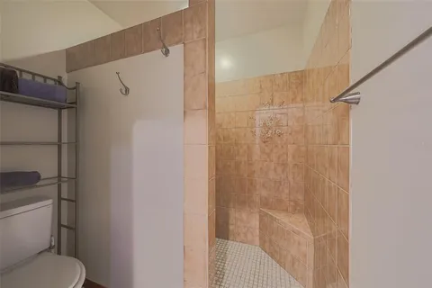 a view of a hallway with a window