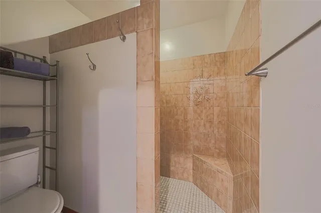 a view of a hallway with a window