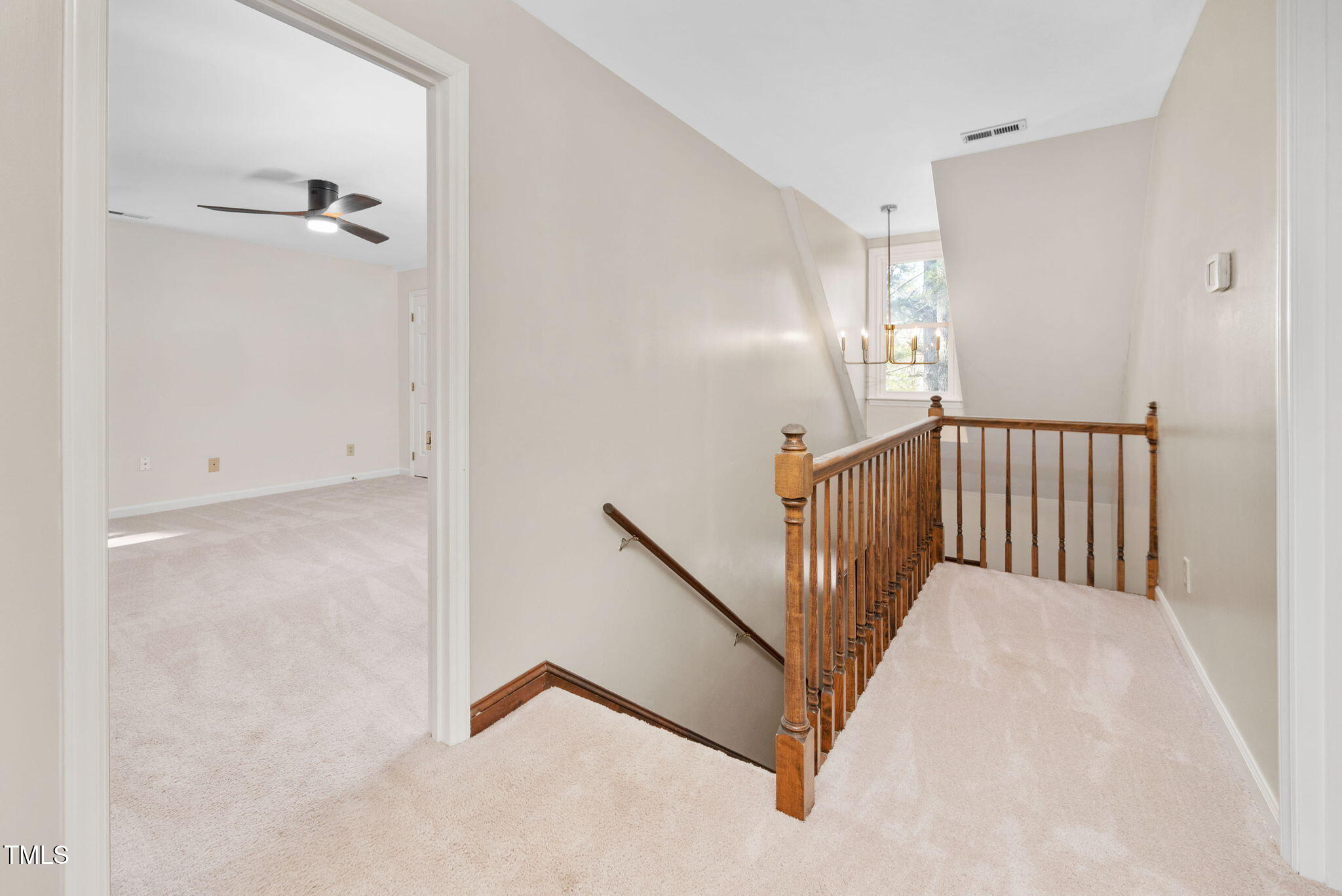 7917 Blaney Franks Road Apex, NC 27539 - Photo 17 of 50 a view of a hallway with staircase