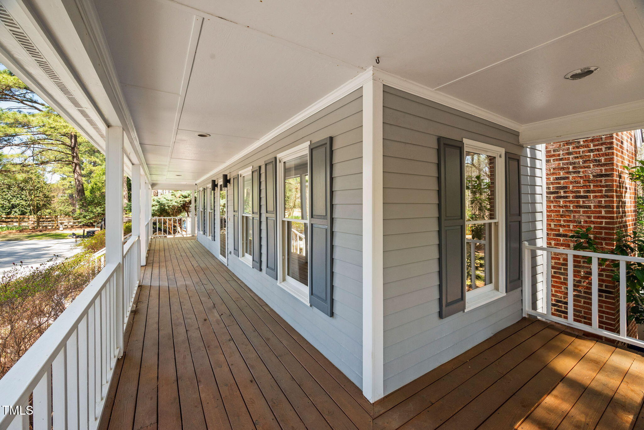7917 Blaney Franks Road Apex, NC 27539 - Photo 27 of 50 a view of a balcony with wooden floor