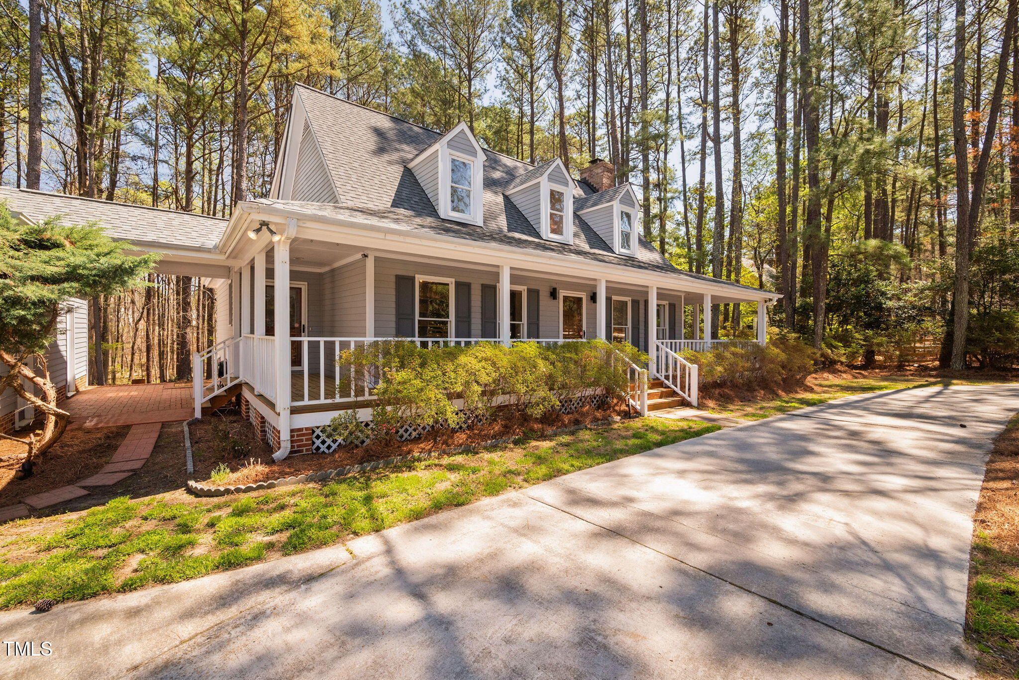 7917 Blaney Franks Road Apex, NC 27539 - Photo 2 of 50 a front view of a house with a yard