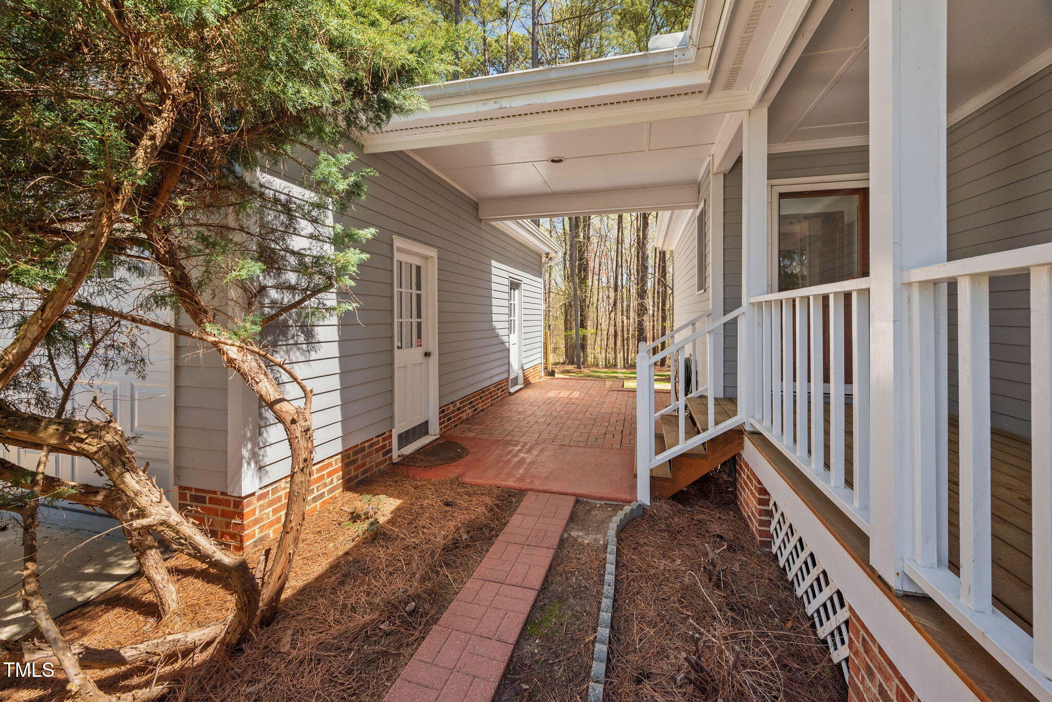 7917 Blaney Franks Road Apex, NC 27539 - Photo 30 of 50 a view of balcony with wooden floor and fence