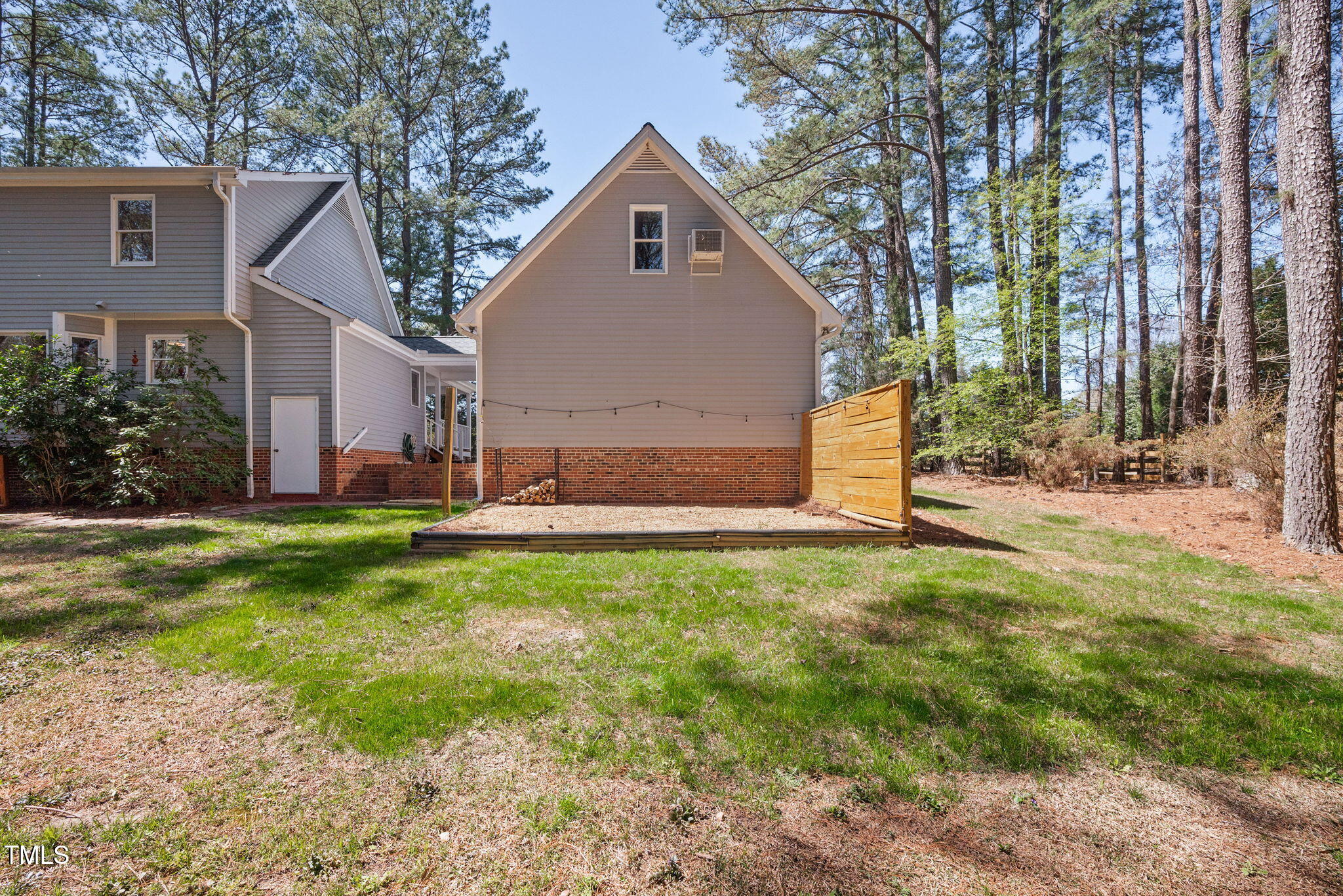 7917 Blaney Franks Road Apex, NC 27539 - Photo 32 of 50 a front view of house with yard and green space