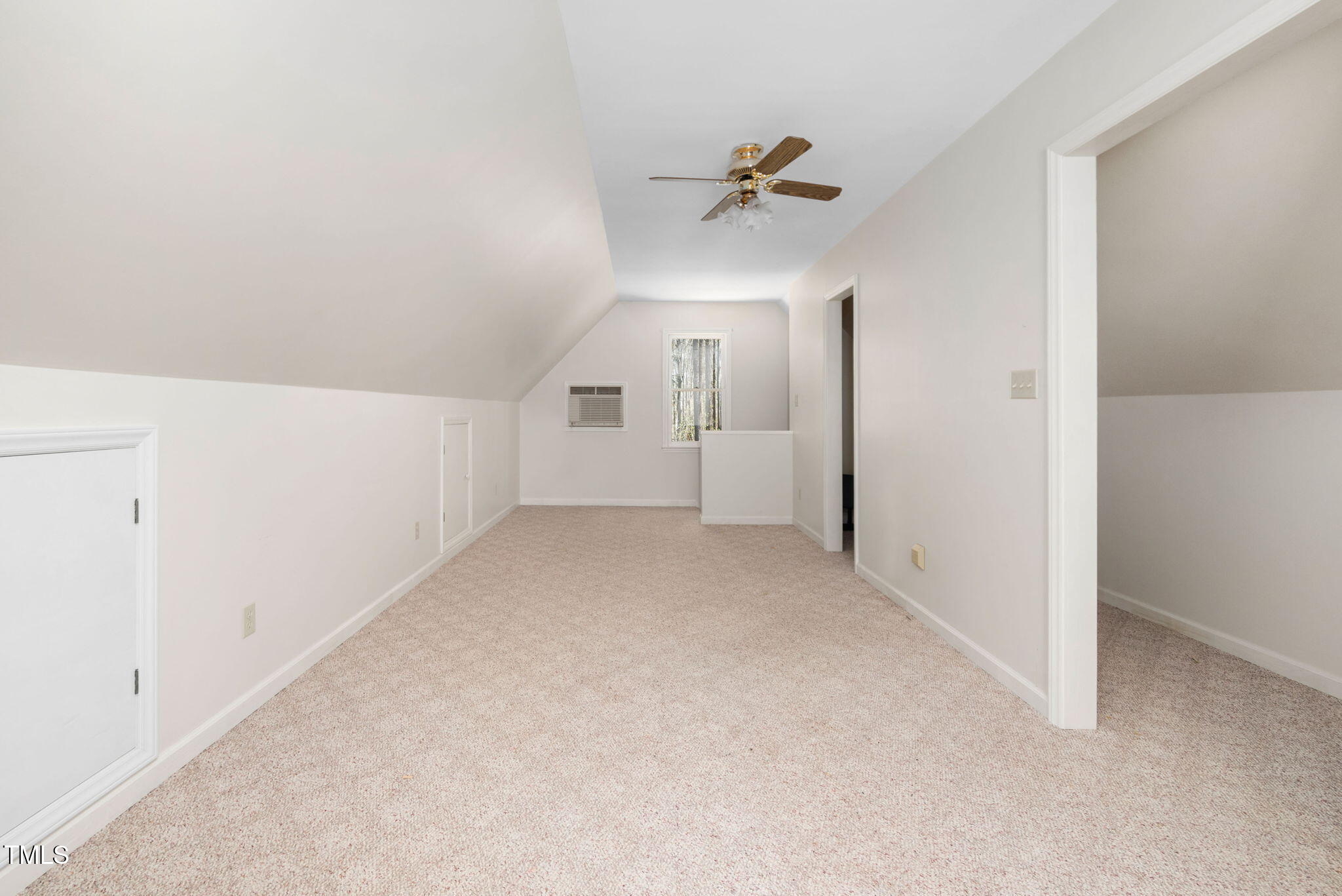 7917 Blaney Franks Road Apex, NC 27539 - Photo 33 of 50 a view of a big room with closet and windows