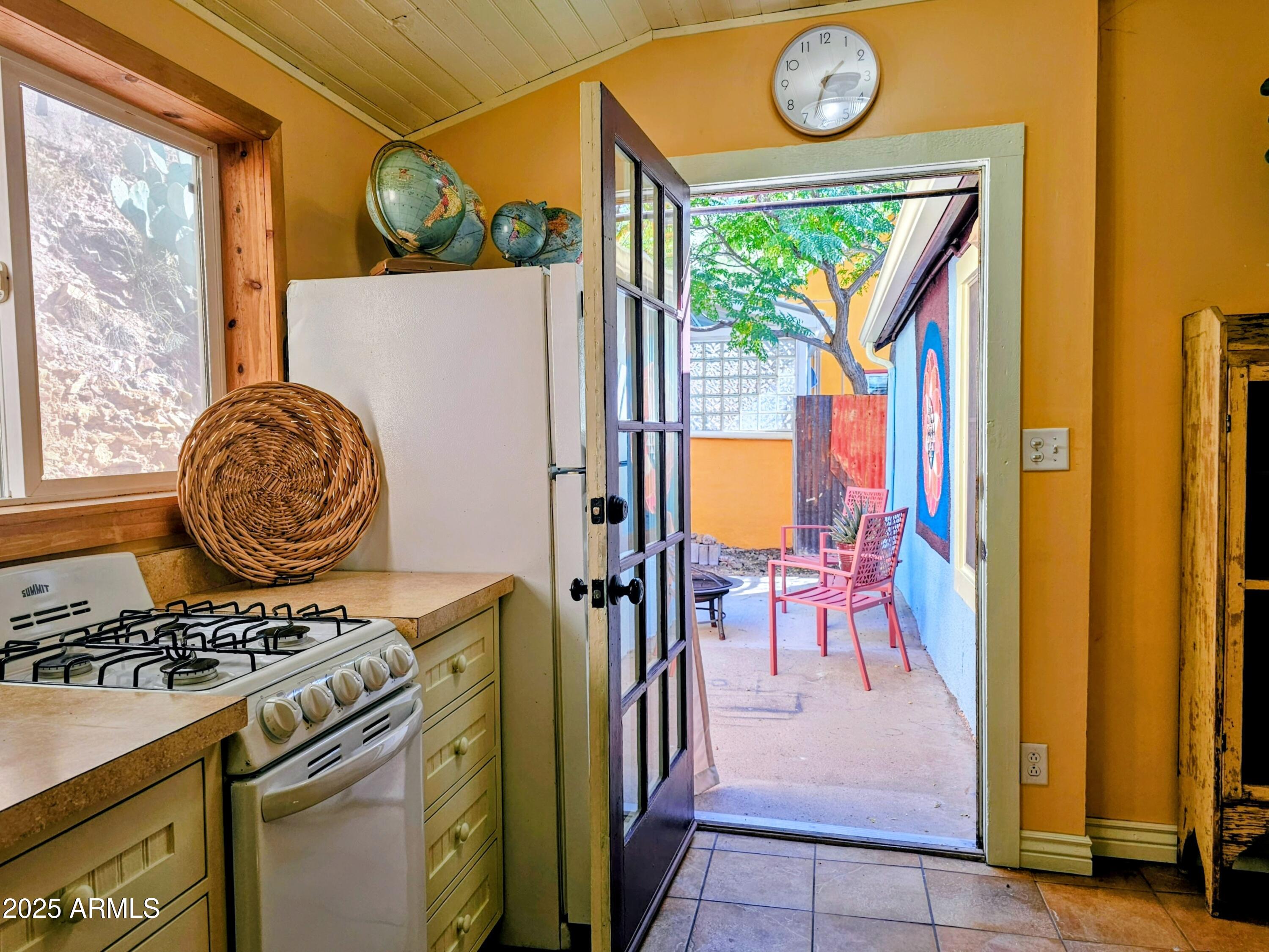 79 Ok Street Bisbee, AZ 85603 - Photo 16 of 33 a view of washer and dryer with a dining table