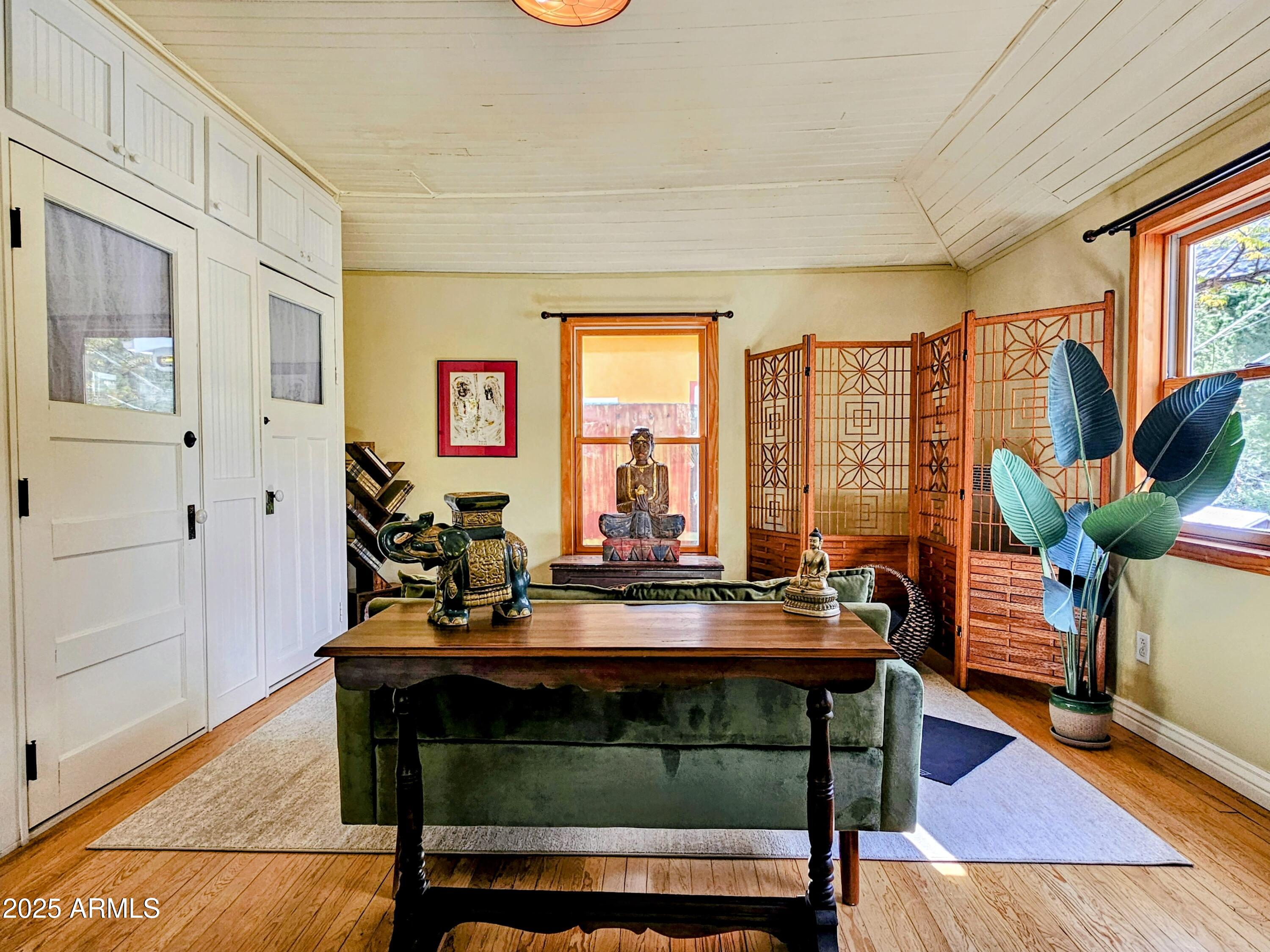 79 Ok Street Bisbee, AZ 85603 - Photo 27 of 33 a room with furniture and a potted plant