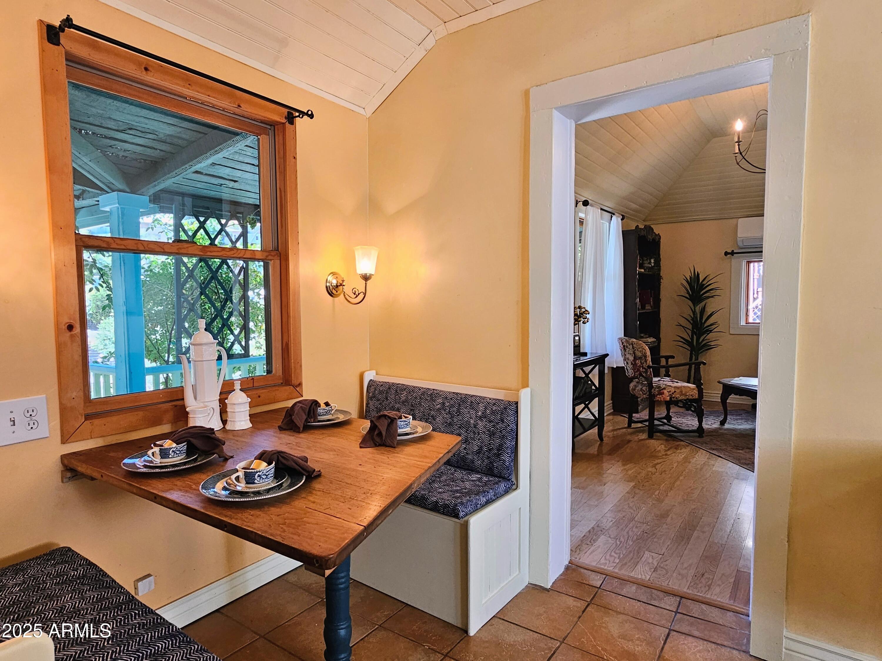 79 Ok Street Bisbee, AZ 85603 - Photo 8 of 33 a living room with furniture and a window