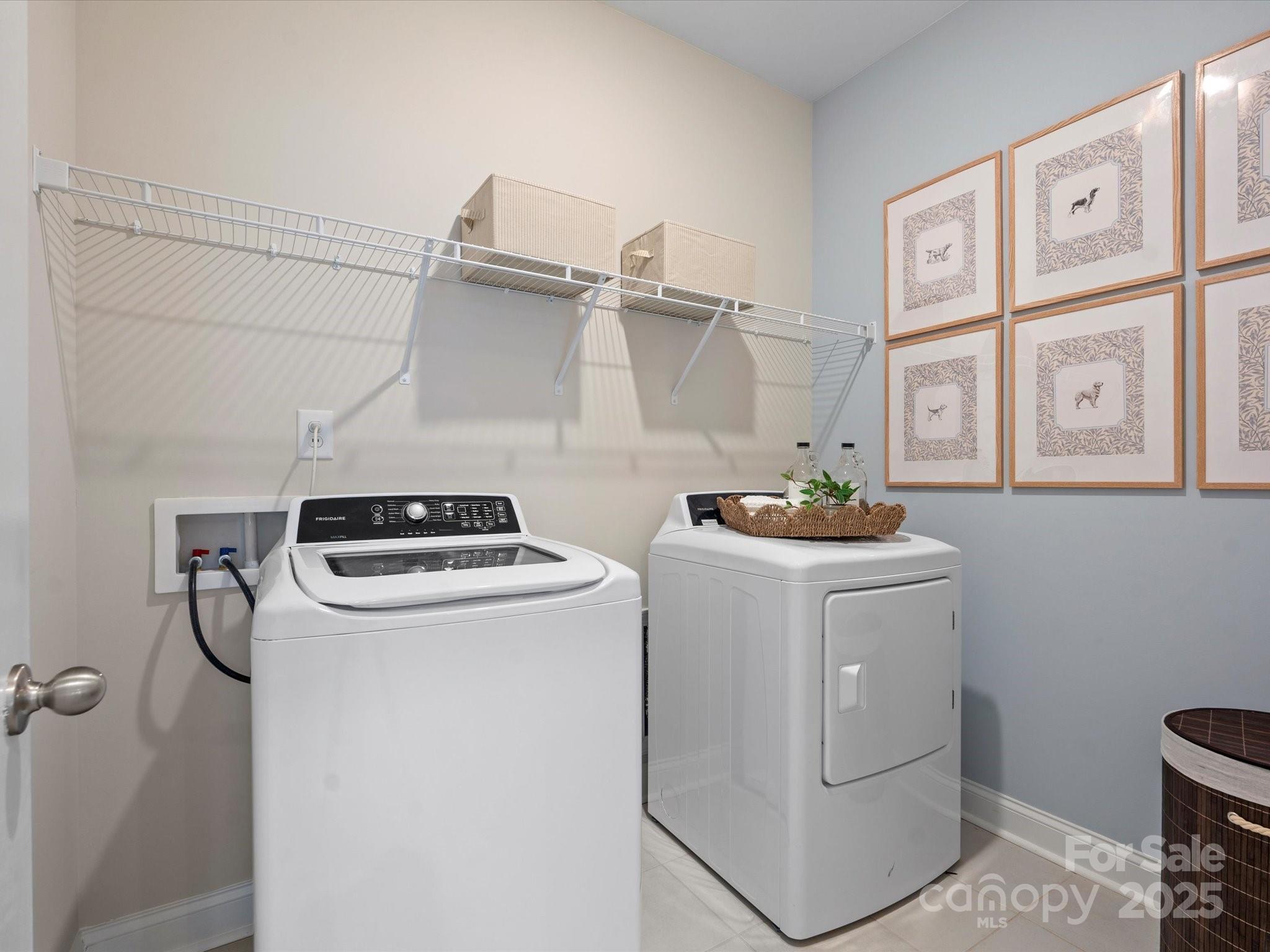 1016 Broken Spur Road Indian Trail, NC 28079 - Photo 10 of 19 a utility room with dryer and washer
