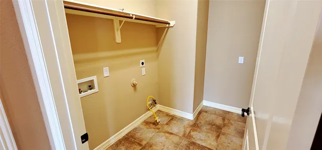 a bathroom with a tub and a shower