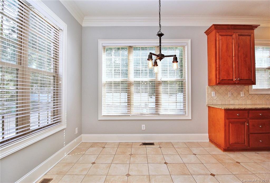 4608 McKee Road Charlotte, NC 28270 - Photo 12 of 32 a view of an empty room with a window