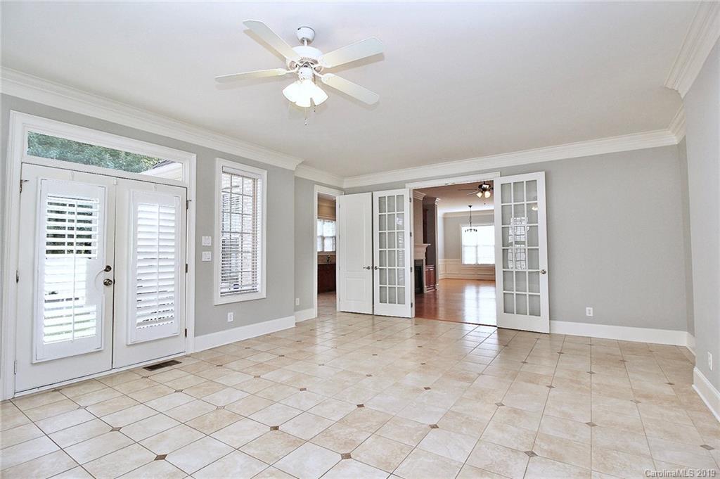 4608 McKee Road Charlotte, NC 28270 - Photo 13 of 32 an empty room with entrance and windows