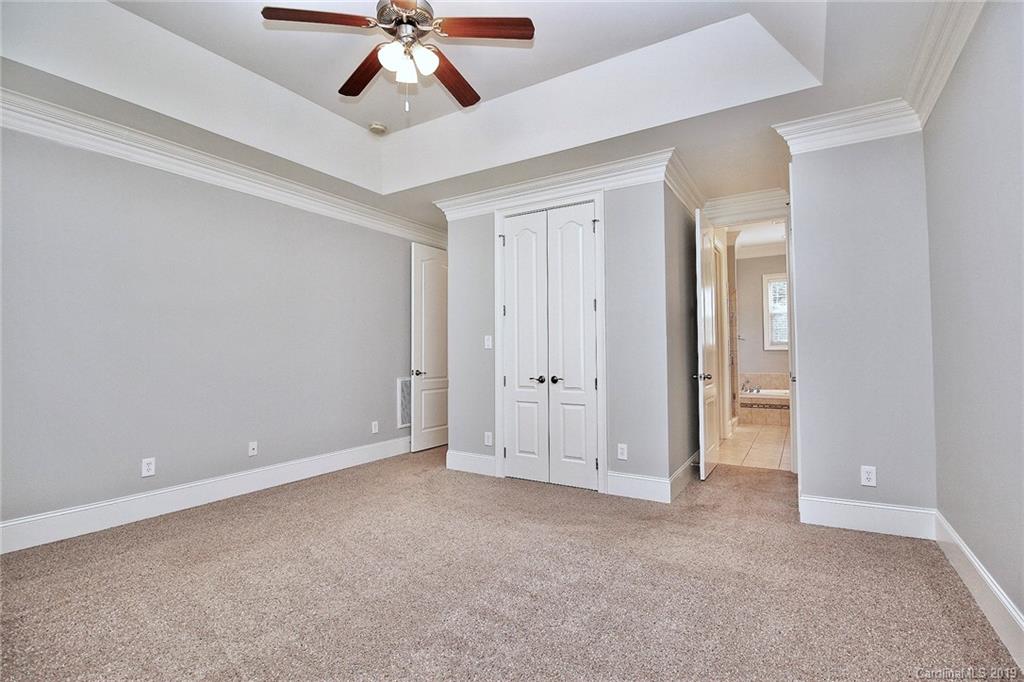 4608 McKee Road Charlotte, NC 28270 - Photo 16 of 32 a view of an empty room and chandelier fan