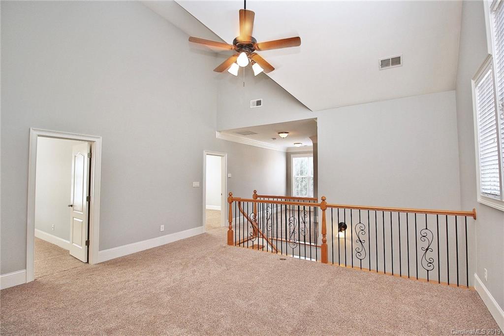 4608 McKee Road Charlotte, NC 28270 - Photo 21 of 32 a view of livingroom with a ceiling fan and window