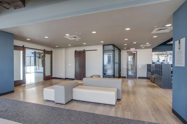 a lobby with furniture and a couch