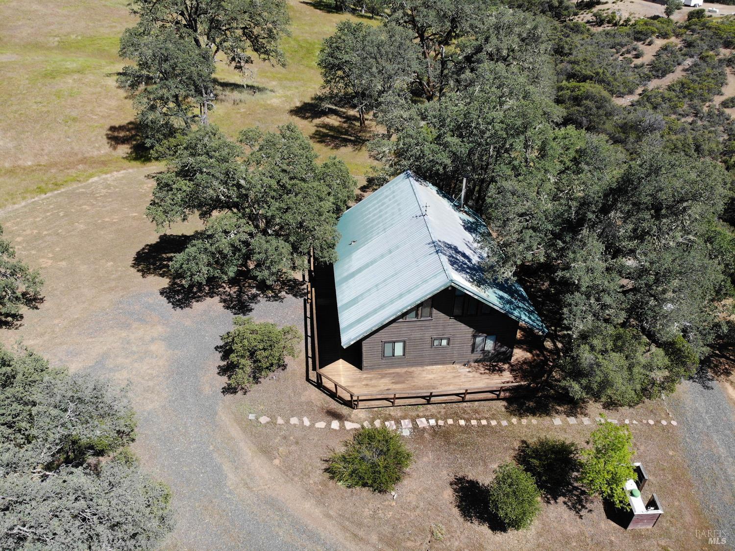 31312 High Point Road Potter Valley, CA 95469 - Photo 2 of 58 a view of a house with a yard and pathway