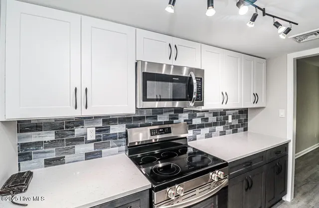 $455,000 | 130 Salter Path Road, Unit 74, Pine Knoll Shores, NC 28512