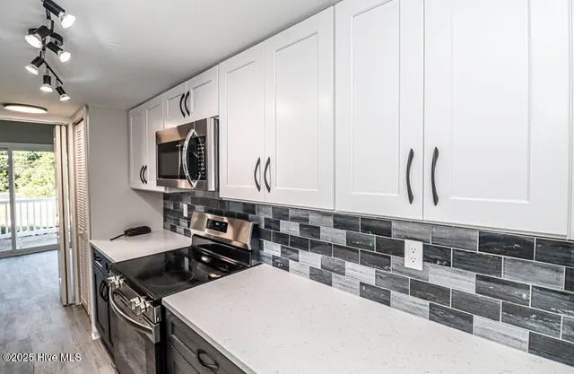 $455,000 | 130 Salter Path Road, Unit 74, Pine Knoll Shores, NC 28512