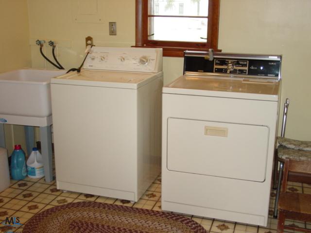 62 West Lapeer Road Peck, MI 48466 - Photo 8 of 25 This is a partial view of the laundry room.