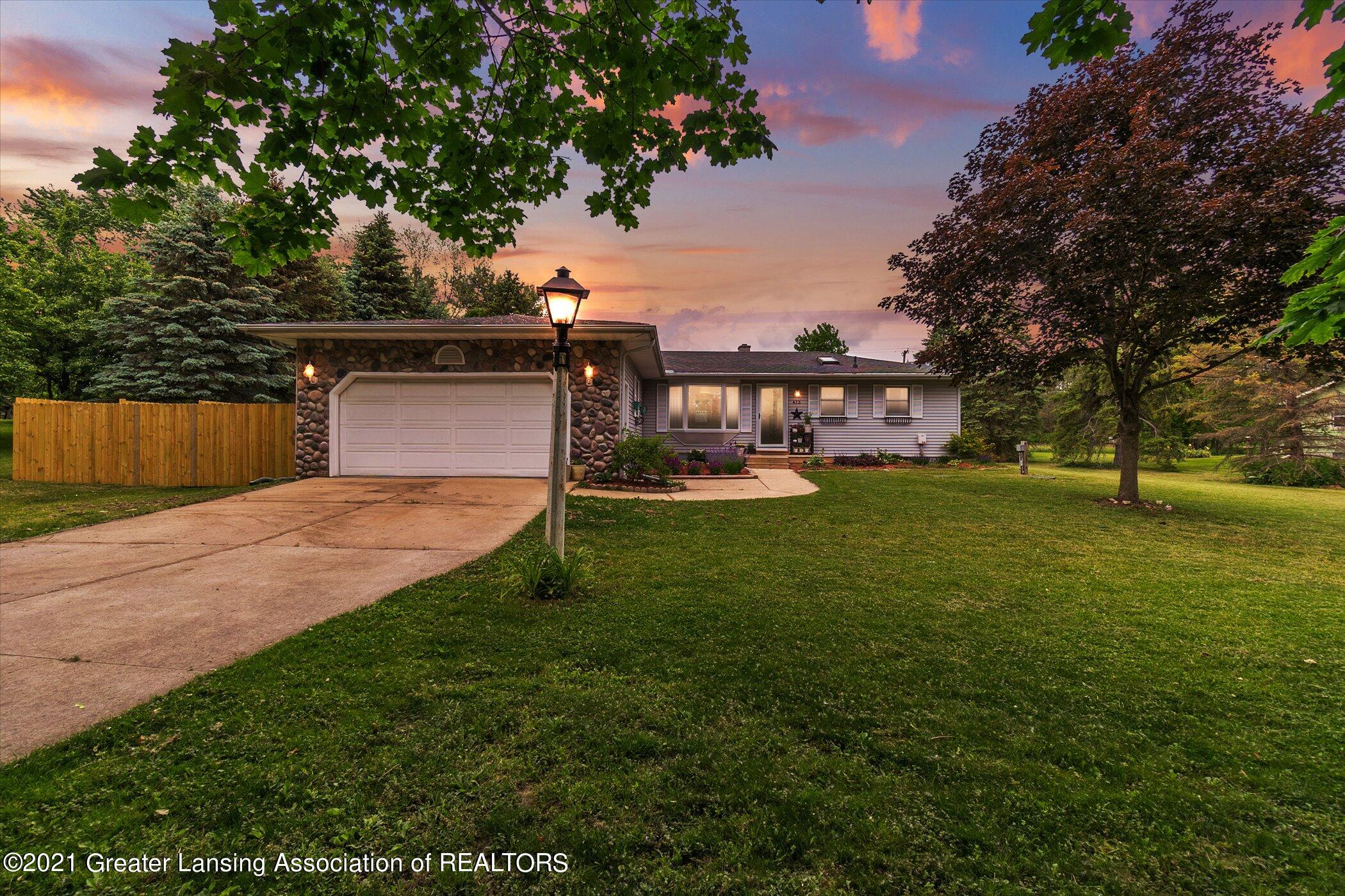 473 Haslett Road Haslett, MI 48840 - Photo 1 of 38 Front