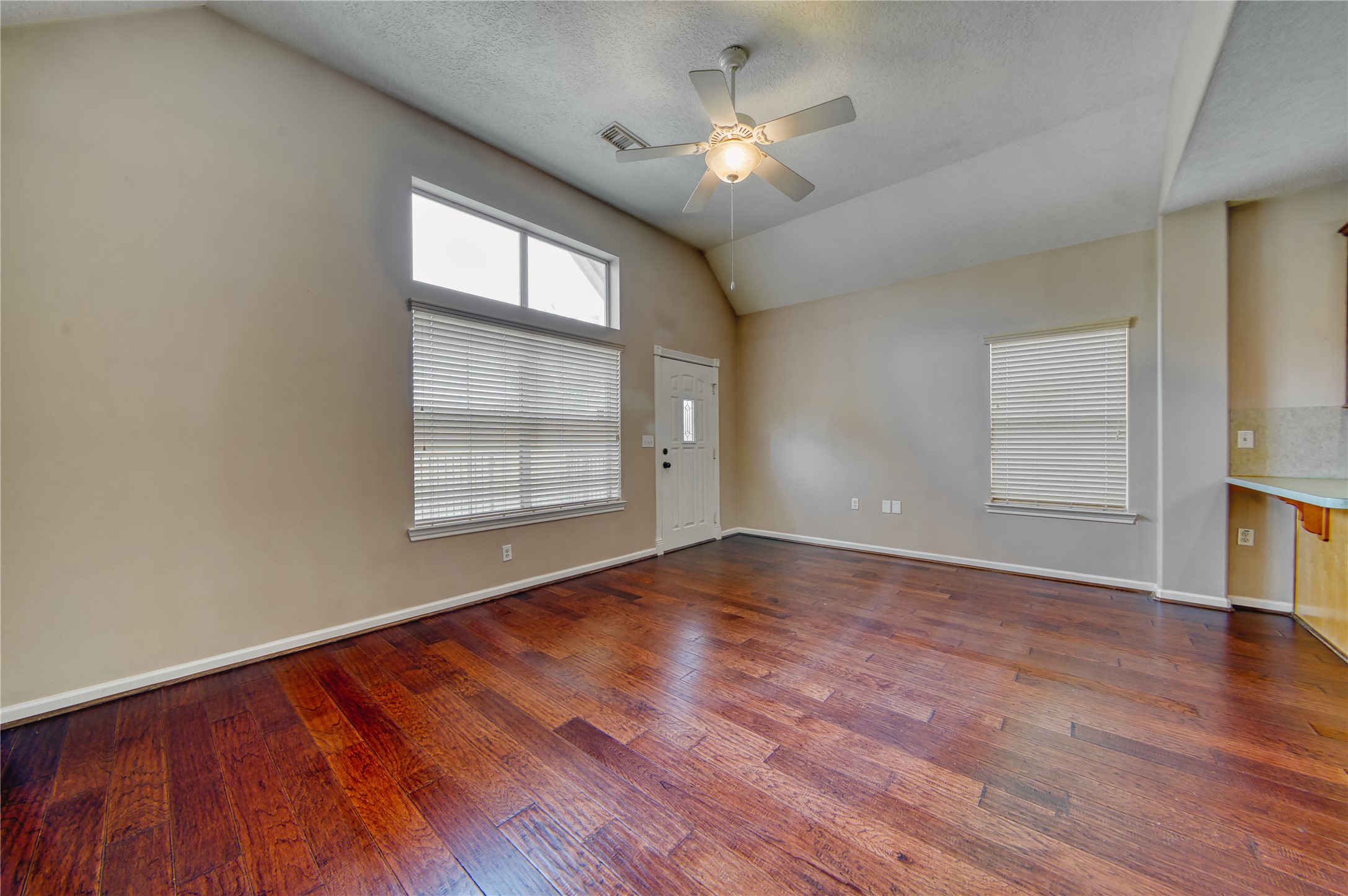 770 Hunt Road, Unit 314 Baytown, TX 77521 - Photo 8 of 26 wooden floor in an empty room with a window