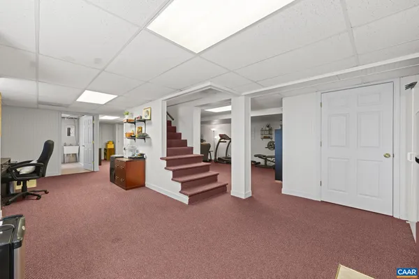 a living room with furniture and a couch