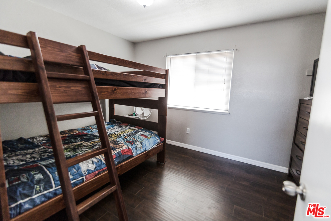 2985 North Chestnut Street Rialto, CA 92376 - Photo 22 of 30 a bedroom with bunk bed
