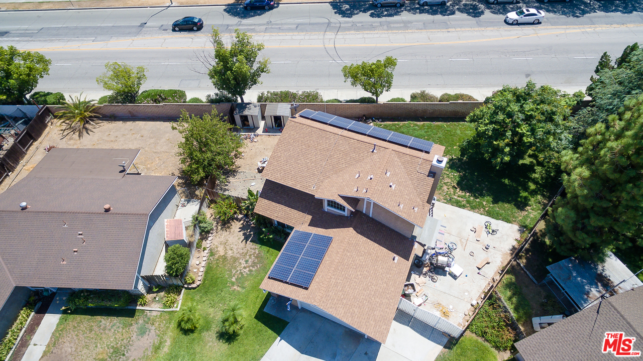 2985 North Chestnut Street Rialto, CA 92376 - Photo 27 of 30 an aerial view of a house with outdoor space and street view