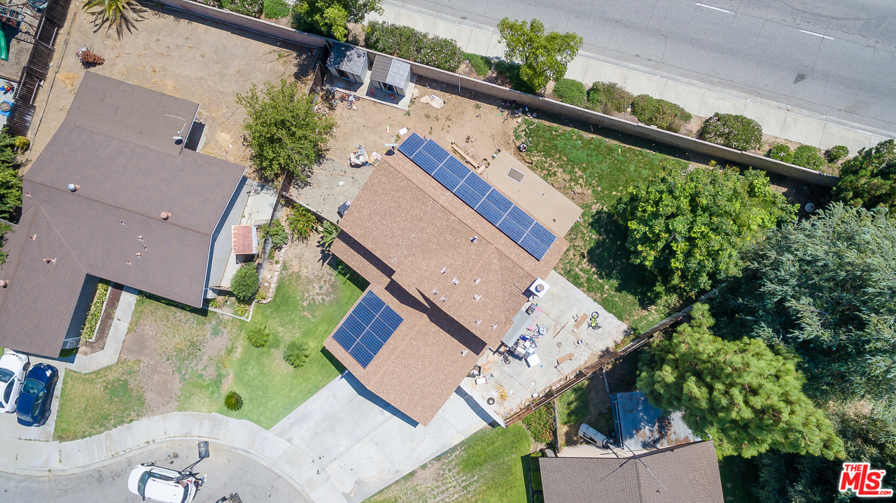 2985 North Chestnut Street Rialto, CA 92376 - Photo 28 of 30 an aerial view of house with a yard