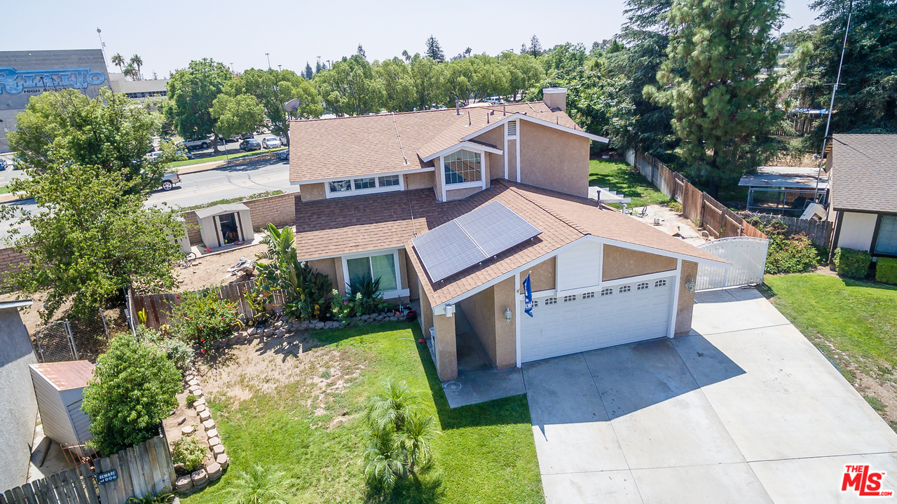 2985 North Chestnut Street Rialto, CA 92376 - Photo 29 of 30 an aerial view of a house with a yard basket ball court and outdoor seating