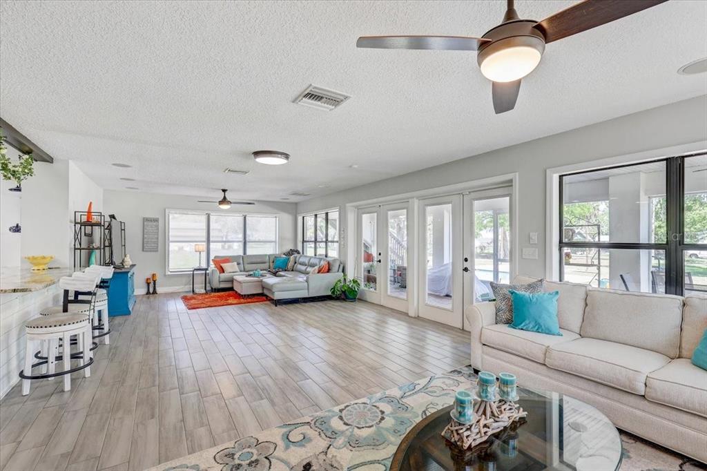 4710 Stearns Road Valrico, FL 33596 - Photo 13 of 63 a living room with furniture and a large window