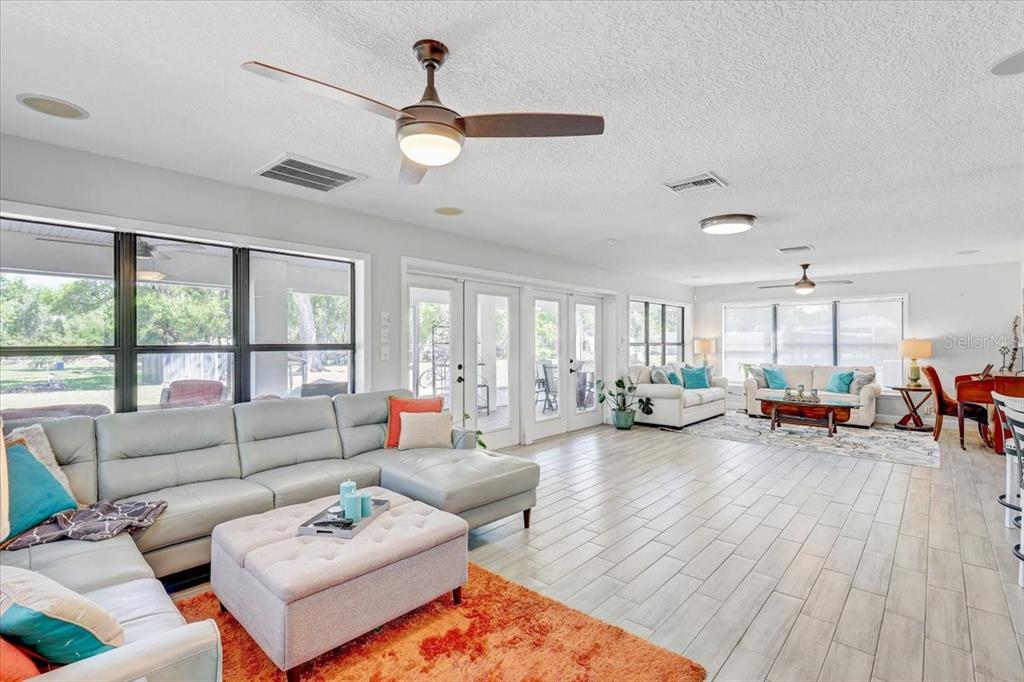 4710 Stearns Road Valrico, FL 33596 - Photo 15 of 63 a living room with furniture and a large window