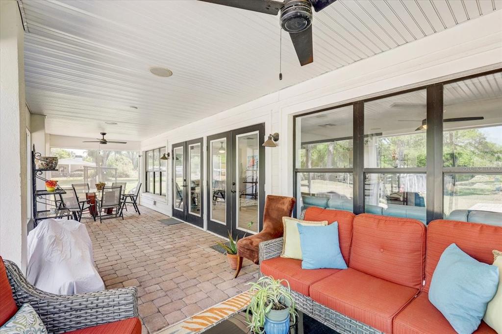 4710 Stearns Road Valrico, FL 33596 - Photo 17 of 63 a living room with furniture and a large window