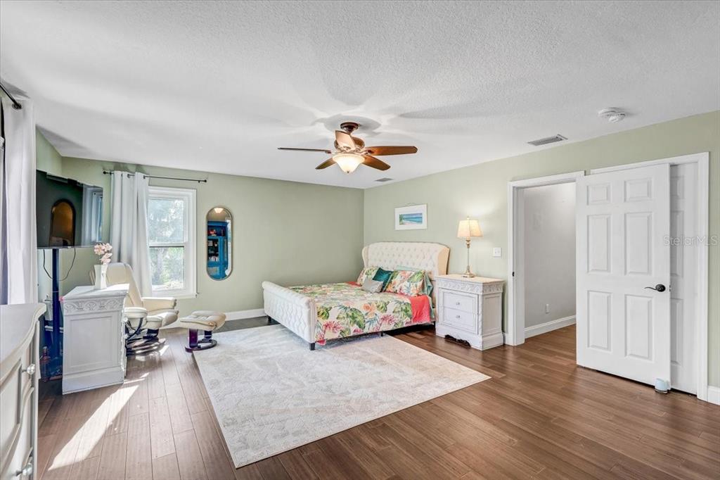 4710 Stearns Road Valrico, FL 33596 - Photo 31 of 63 a living room with furniture and wooden floor